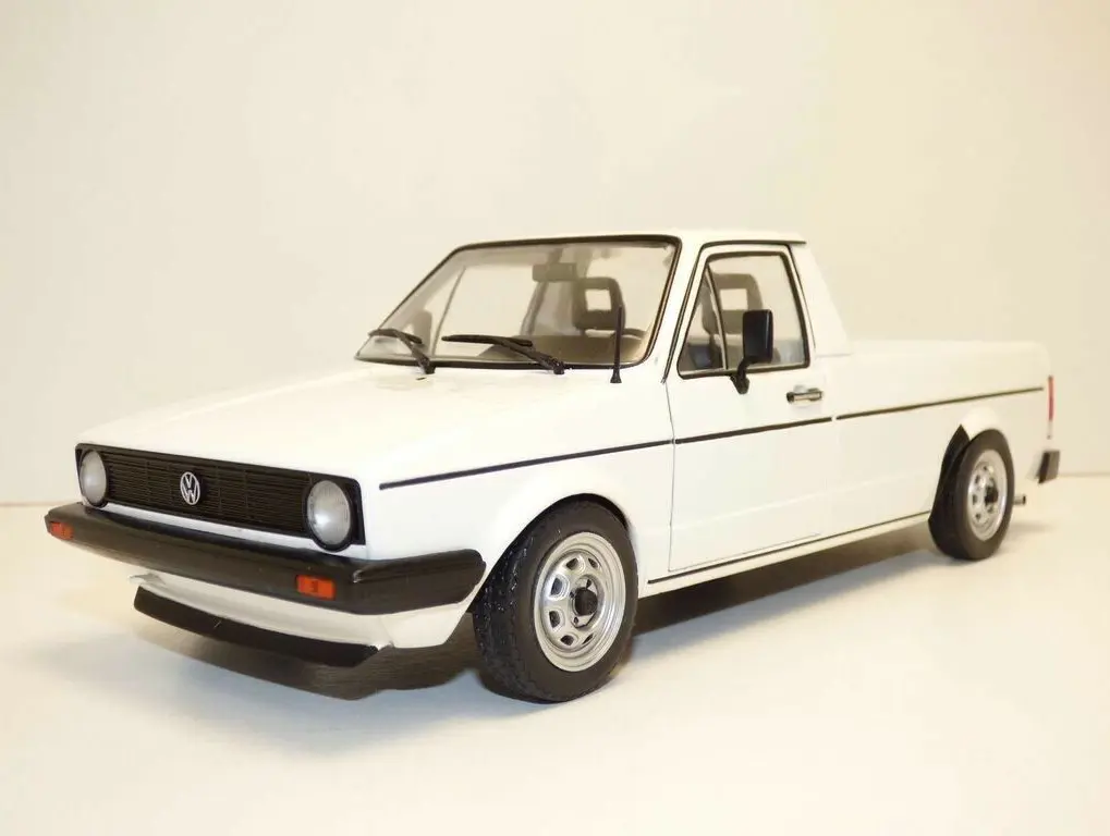 White Volkswagen Golf pickup truck model.