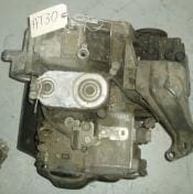 Used car engine with attached parts.