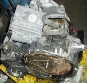 Used car engine transmission with parts.