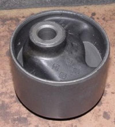 Engine motor mount with a hole.