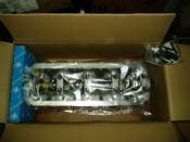 New engine cylinder head in a box.