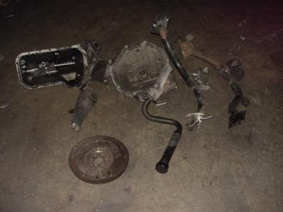 Disassembled car transmission parts.