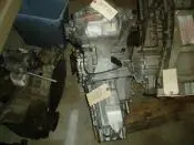 Used car transmission with price tags.