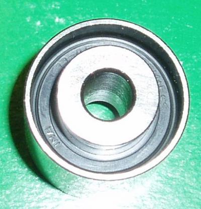 Silver bearing with a black rim.