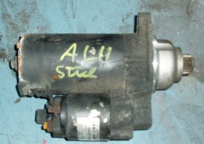 Used car starter motor with label.