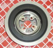 A silver and black car engine pulley.